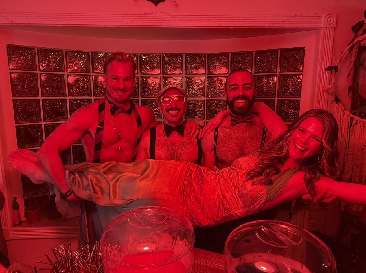 Jenna lifted by the bartenders